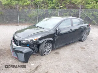 2023 Kia Forte GT-Line z VIN 3KPF54ADXPE627228, wystawiony jako IAAI lot #42022939 z przebiegiem 50 574 mil mil oraz . Historia ofert i sprzedaży dostępna na DreamBid. Obrazek 2.