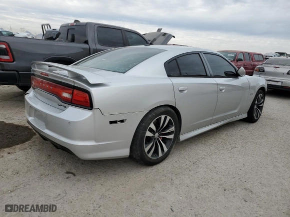 2012 Dodge Charger SRT8 with VIN 2C3CDXEJ6CH114987, listed as a Copart auction lot 87500795 with 165,176 mi miles and Salvage Title. Bid and sale history available at carsss.com. Image 3.
