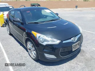 2013 Hyundai Veloster w/Gray Int with VIN KMHTC6AD2DU140750, listed as a IAAI auction lot 42615351 with 191,873 mi miles and . Bid and sale history available at DreamBid. Image 1.