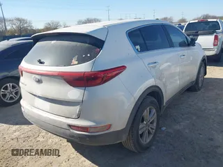 2018 Kia Sportage LX with VIN KNDPM3AC2J7445877, listed as a IAAI auction lot 41749884 with 150,320 mi miles and . Bid and sale history available at DreamBid. Image 4.