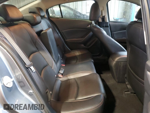 2015 Mazda 3 i Grand Touring z VIN 3MZBM1W75FM220907, wystawiony jako Copart lot #58464185 z przebiegiem 144 435 mil mil oraz Szkoda całkowita • Salvage title. Historia ofert i sprzedaży dostępna na DreamBid. Obrazek 10.