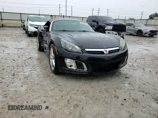 2009 Saturn Sky Red Line z VIN 1G8MG35X39Y106052, wystawiony jako Copart lot #69893854 z przebiegiem 124 937 mil mil oraz Szkody całkowita. Historia ofert i sprzedaży dostępna na DreamBid. Obrazek 10.