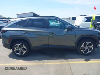 2022 Hyundai Tucson SEL z VIN 5NMJCCAE4NH096813, wystawiony jako IAAI lot #41899641 z przebiegiem 23 668 mil mil oraz . Historia ofert i sprzedaży dostępna na DreamBid. Obrazek 14.