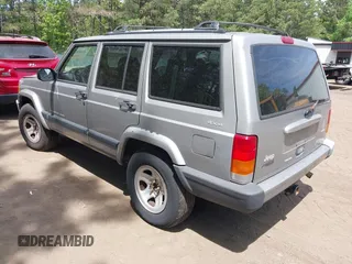 2000 Jeep Cherokee z VIN 1J4FF48S5YL138739, wystawiony jako IAAI lot #42109922 z przebiegiem 199 621 mil mil oraz . Historia ofert i sprzedaży dostępna na DreamBid. Obrazek 3.