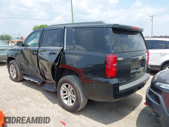 2019 Chevrolet Tahoe LT z VIN 1GNSKBKC5KR388869, wystawiony jako IAAI lot #42354451 z przebiegiem 111 359 mil mil oraz . Historia ofert i sprzedaży dostępna na DreamBid. Obrazek 3.