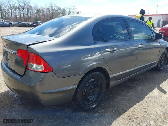 2009 Honda Civic Sdn LX with VIN 2HGFA16599H358465, listed as a IAAI auction lot 41886685 with 188,273 mi miles. Bid and sale history available at carsss.com. Image 4.