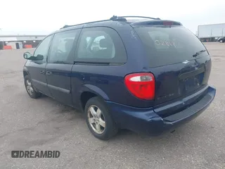 2005 Dodge Caravan SE with VIN 1D4GP24R95B420644, listed as a IAAI auction lot 42302868 with 256,701 mi miles and . Bid and sale history available at DreamBid. Image 3.