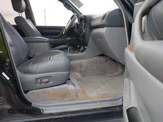 2001 Toyota Land Cruiser z VIN JTEHT05J812001099, wystawiony jako IAAI lot #42057630 z przebiegiem Nie podano mil oraz . Historia ofert i sprzedaży dostępna na DreamBid. Obrazek 5.