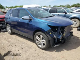 2021 Chevrolet Equinox Premier z VIN 2GNAXXEV0M6133133, wystawiony jako Copart lot #58995075 z przebiegiem 39 599 mil mil oraz Szkoda całkowita • Salvage title. Historia ofert i sprzedaży dostępna na DreamBid. Obrazek 4.
