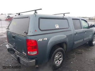 2012 GMC Sierra 1500 SLE with VIN 3GTP2VE7XCG259199, listed as a IAAI auction lot 41998611 with 376,856 mi miles. Bid and sale history available at carsss.com. Image 4.