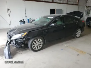 2015 Kia Optima EX with VIN 5XXGN4A7XFG414607, listed as a Copart auction lot 58221515 with 138,126 mi miles and Salvage title. Bid and sale history available at DreamBid. Image 1.