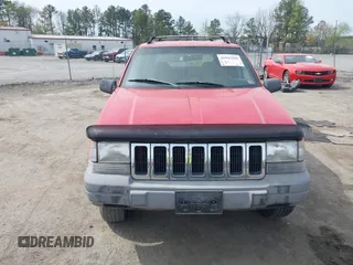 1996 Jeep Grand Cherokee Laredo with VIN 1J4FX58S4TC346218, listed as a IAAI auction lot 41943268 with 138,431 mi miles and . Bid and sale history available at DreamBid. Image 12.