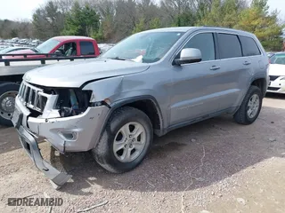 2014 Jeep Grand Cherokee Laredo with VIN 1C4RJFAG7EC243121, listed as a IAAI auction lot 41925695 with 147,999 mi miles. Bid and sale history available at carsss.com. Image 17.