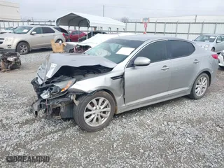 2015 Kia Optima EX with VIN 5XXGN4A75FG405216, listed as a IAAI auction lot 41794597 with 237,403 mi miles. Bid and sale history available at carsss.com. Image 2.