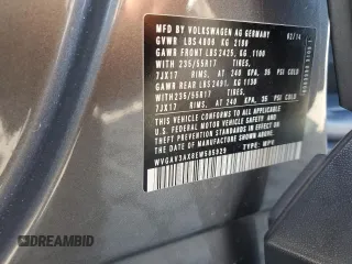 2014 Volkswagen Tiguan SEL with VIN WVGAV3AX8EW585929, listed as a Copart auction lot 61462205 with 63,899 mi miles and Salvage title. Bid and sale history available at DreamBid. Image 13.
