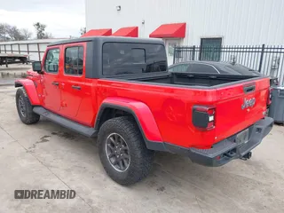 2022 Jeep Gladiator High Altitude with VIN 1C6HJTFG0NL105043, listed as a IAAI auction lot 41290790 with 73,595 mi miles and . Bid and sale history available at DreamBid. Image 3.