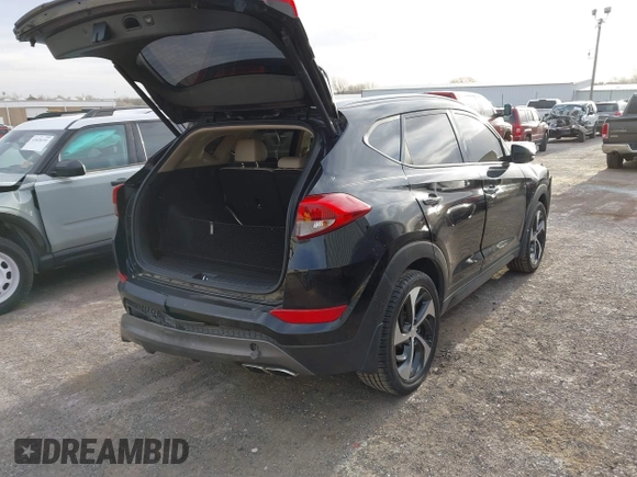 2016 Hyundai Tucson Limited with VIN KM8J33A28GU157187, listed as a IAAI auction lot 41825266 with 137,649 mi miles. Bid and sale history available at carsss.com. Image 4.