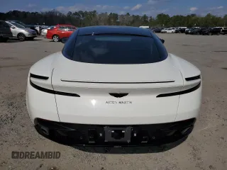 2019 Aston Martin DB11 V8 z VIN SCFRMFAW0KGL05298, wystawiony jako Copart lot #41977185 z przebiegiem 21 000 mil mil oraz Nie do naprawy. Historia ofert i sprzedaży dostępna na DreamBid. Obrazek 6.