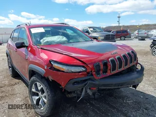 2015 Jeep Cherokee Trailhawk with VIN 1C4PJMBS0FW728361, listed as a IAAI auction lot 41978853 with 123,127 mi miles. Bid and sale history available at carsss.com. Image 6.