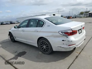 2018 BMW 5 Series 530e xDrive with VIN WBAJB1C58JB084907, listed as a Copart auction lot 49901795 with 109,617 mi miles and Salvage title. Bid and sale history available at DreamBid. Image 2.