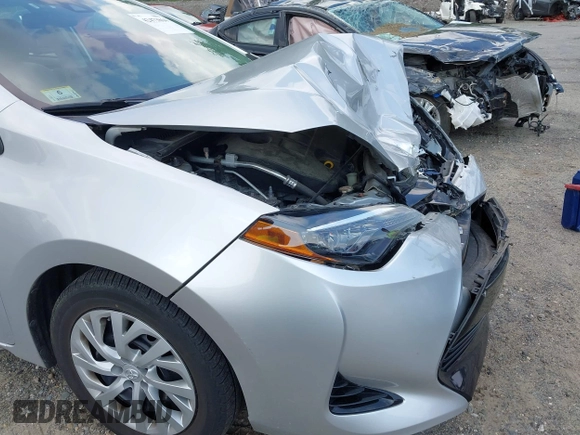 2018 Toyota Corolla L with VIN 2T1BURHE7JC038172, listed as a IAAI auction lot 42473864 with 83,657 mi miles and . Bid and sale history available at DreamBid. Image 17.