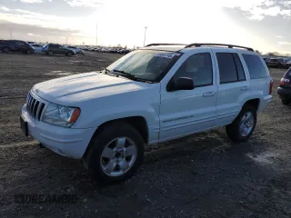 2002 Jeep Grand Cherokee Limited with VIN 1J4GW58N52C102125, listed as a Copart auction lot 45601745 with 194,818 mi miles and Salvage title. Bid and sale history available at DreamBid. Image 1.