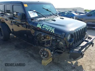 2020 Jeep Wrangler Unlimited Sahara with VIN 1C4HJXEG6LW211932, listed as a IAAI auction lot 42040546 with 74,732 mi miles and . Bid and sale history available at DreamBid. Image 6.