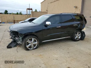 2012 Dodge Durango Citadel with VIN 1C4RDHEG7CC247504, listed as a Copart auction lot 70443154 with 115,888 mi miles and Salvage title. Bid and sale history available at DreamBid. Image 1.