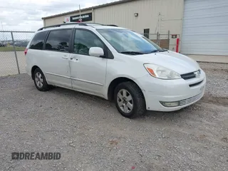 2004 Toyota Sienna XLE with VIN 5TDZA22C74S061016, listed as a IAAI auction lot 41846522 with 264,197 mi miles. Bid and sale history available at carsss.com. Image 1.