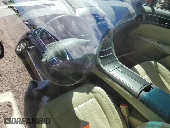 2013 Lincoln MKZ z VIN 3LN6L2G95DR804619, wystawiony jako Copart lot #57101315 z przebiegiem Nie podano mil oraz Szkoda całkowita • Salvage title. Historia ofert i sprzedaży dostępna na DreamBid. Obrazek 7.