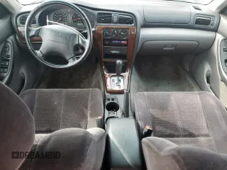 2003 Subaru Legacy L with VIN 4S3BE635337206073, listed as a Copart auction lot 54269664 with 206,230 mi miles and Salvage title. Bid and sale history available at DreamBid. Image 8.