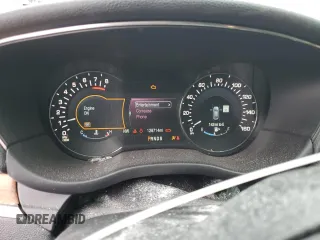 2015 Lincoln MKC z VIN 5LMTJ2AHXFUJ10820, wystawiony jako Copart lot #57139315 z przebiegiem 128 714 mil mil oraz Szkody całkowita. Historia ofert i sprzedaży dostępna na DreamBid. Obrazek 9.