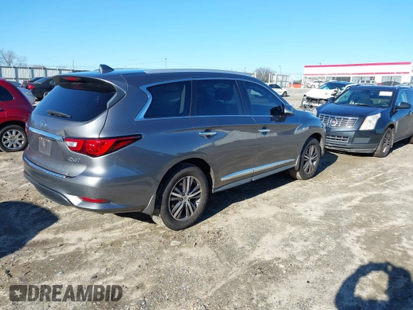 2016 Infiniti QX60 with VIN 5N1AL0MM0GC524715, listed as a IAAI auction lot 41215072 with 145,633 mi miles and . Bid and sale history available at DreamBid. Image 4.