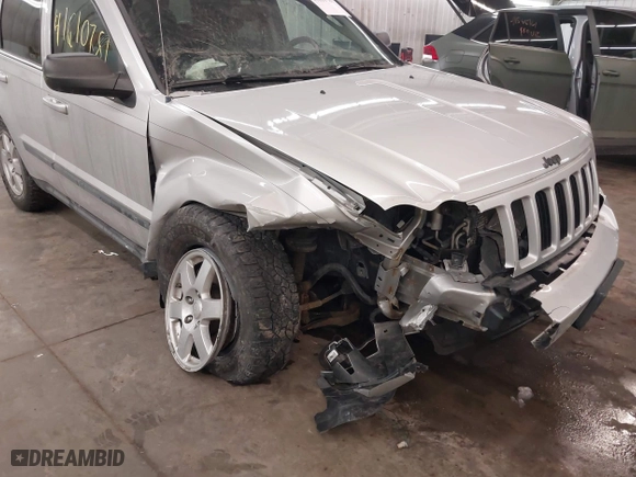 2009 Jeep Grand Cherokee Laredo with VIN 1J8GR48KX9C516873, listed as a IAAI auction lot 41610781 with 199,246 mi miles. Bid and sale history available at carsss.com. Image 6.