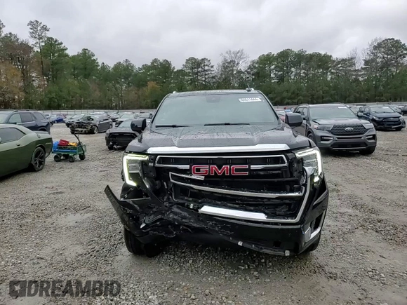 2023 GMC Yukon SLT with VIN 1GKS2BKD7PR122685, listed as a Copart auction lot 84611444 with 52,271 mi miles and Salvage Title. Bid and sale history available at carsss.com. Image 12.