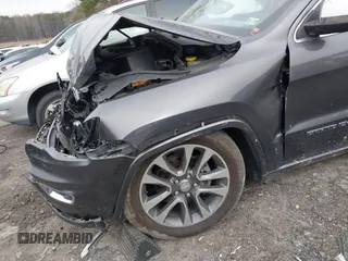 2017 Jeep Grand Cherokee Overland with VIN 1C4RJFCG8HC772837, listed as a IAAI auction lot 41304895 with 71,338 mi miles. Bid and sale history available at carsss.com. Image 16.