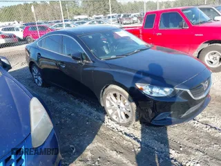 2017 Mazda Mazda6 Touring with VIN JM1GL1V59H1128257, listed as a IAAI auction lot 41503300 with 123,640 mi miles. Bid and sale history available at carsss.com. Image 1.