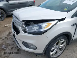 2019 Ford Escape Titanium with VIN 1FMCU9J97KUB85528, listed as a IAAI auction lot 41708344 with 88,841 mi miles. Bid and sale history available at carsss.com. Image 6.