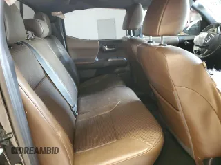 2018 Toyota Tacoma SR5 z VIN 3TMEZ5CN3JM072275, wystawiony jako Copart lot #56141695 z przebiegiem Nie podano mil oraz Czysty tytuł • Clean title. Historia ofert i sprzedaży dostępna na DreamBid. Obrazek 10.
