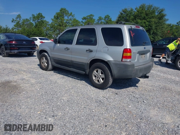 2007 Ford Escape XLS with VIN 1FMYU02Z87KA02382, listed as a IAAI auction lot 42683581 with 309,851 mi miles and . Bid and sale history available at DreamBid. Image 3.