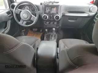 2016 Jeep Wrangler Unlimited Sahara with VIN 1C4BJWEGXGL264740, listed as a Copart auction lot 57225115 with 183,647 mi miles and Salvage title. Bid and sale history available at DreamBid. Image 8.