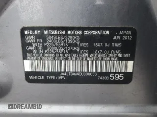 2013 Mitsubishi Outlander SE z VIN JA4JT3AW4DU000656, wystawiony jako Copart lot #51808395 z przebiegiem 158 479 mil mil oraz Szkoda całkowita • Salvage title. Historia ofert i sprzedaży dostępna na DreamBid. Obrazek 13.