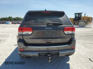 2014 Jeep Grand Cherokee Summit with VIN 1C4RJFJGXEC159438, listed as a Copart auction lot 50864595 with 134,558 mi miles and Salvage title. Bid and sale history available at DreamBid. Image 6.
