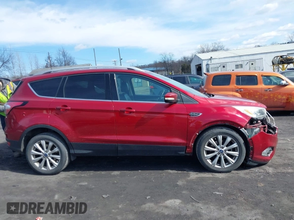 2017 Ford Escape Titanium with VIN 1FMCU0JD9HUC71738, listed as a IAAI auction lot 41673228 with 173,615 mi miles. Bid and sale history available at carsss.com. Image 13.