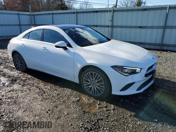 2021 Mercedes-Benz CLA with VIN W1K5J4HBXMN199220, listed as a Copart auction lot 86673214 with 29,801 mi miles and Salvage Title. Bid and sale history available at carsss.com. Image 4.
