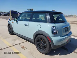 2013 MINI Hardtop with VIN WMWSU3C57DT690398, listed as a IAAI auction lot 41989221 with 112,954 mi miles and . Bid and sale history available at DreamBid. Image 3.