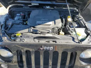 2014 Jeep Wrangler Sahara with VIN 1C4AJWBG2EL194843, listed as a Copart auction lot 79590514 with 80,574 mi miles and Non Repairable. Bid and sale history available at DreamBid. Image 11.