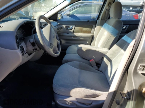 2001 Ford Taurus LX Standard z VIN 1FAFP52U51A138332, wystawiony jako Copart lot #88528355 z przebiegiem 166 511 mil mil oraz Szkoda całkowita • Salvage title. Historia ofert i sprzedaży dostępna na DreamBid. Obrazek 7.