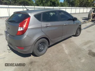 2014 Hyundai Accent GS with VIN KMHCT5AE6EU157393, listed as a IAAI auction lot 42188160 with 221,375 mi miles and . Bid and sale history available at DreamBid. Image 4.