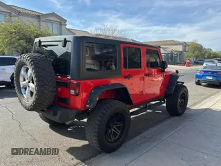 2018 Jeep Wrangler JK Unlimited Sport S with VIN 1C4BJWDG7JL828871, listed as a Copart auction lot 87530425 with 60,958 mi miles and Clean Title. Bid and sale history available at carsss.com. Image 4.